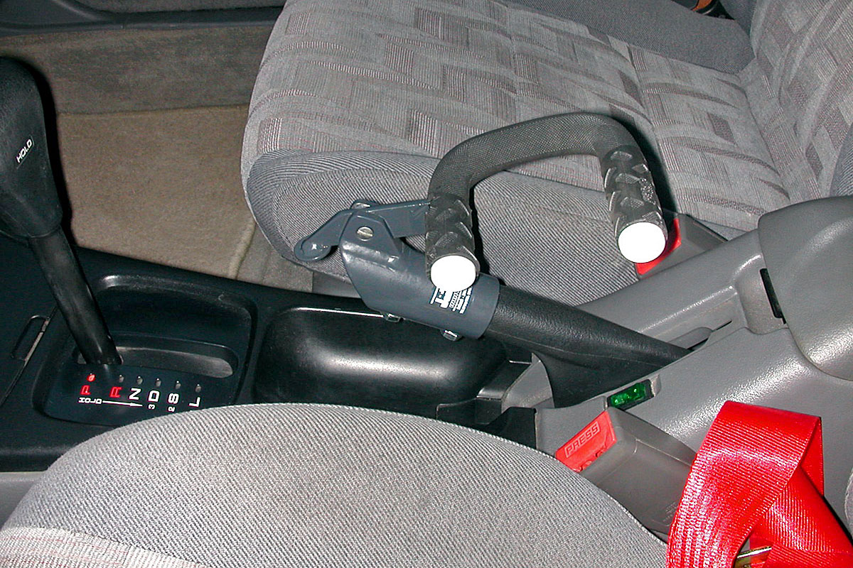 Nástavec ruční brzdy – kvadro ve voze MAZDA 626