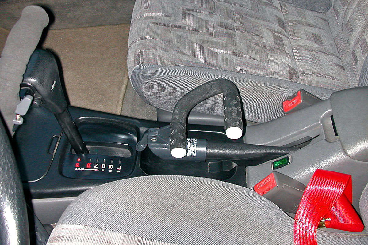 Nástavec ruční brzdy – kvadro ve voze MAZDA 626